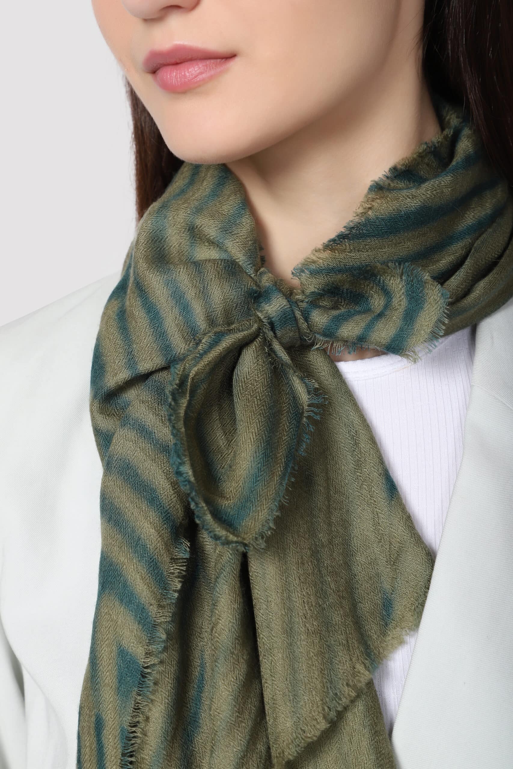 Close-Up shot of a model wearing military green diagonal arashi scarf - Me & K