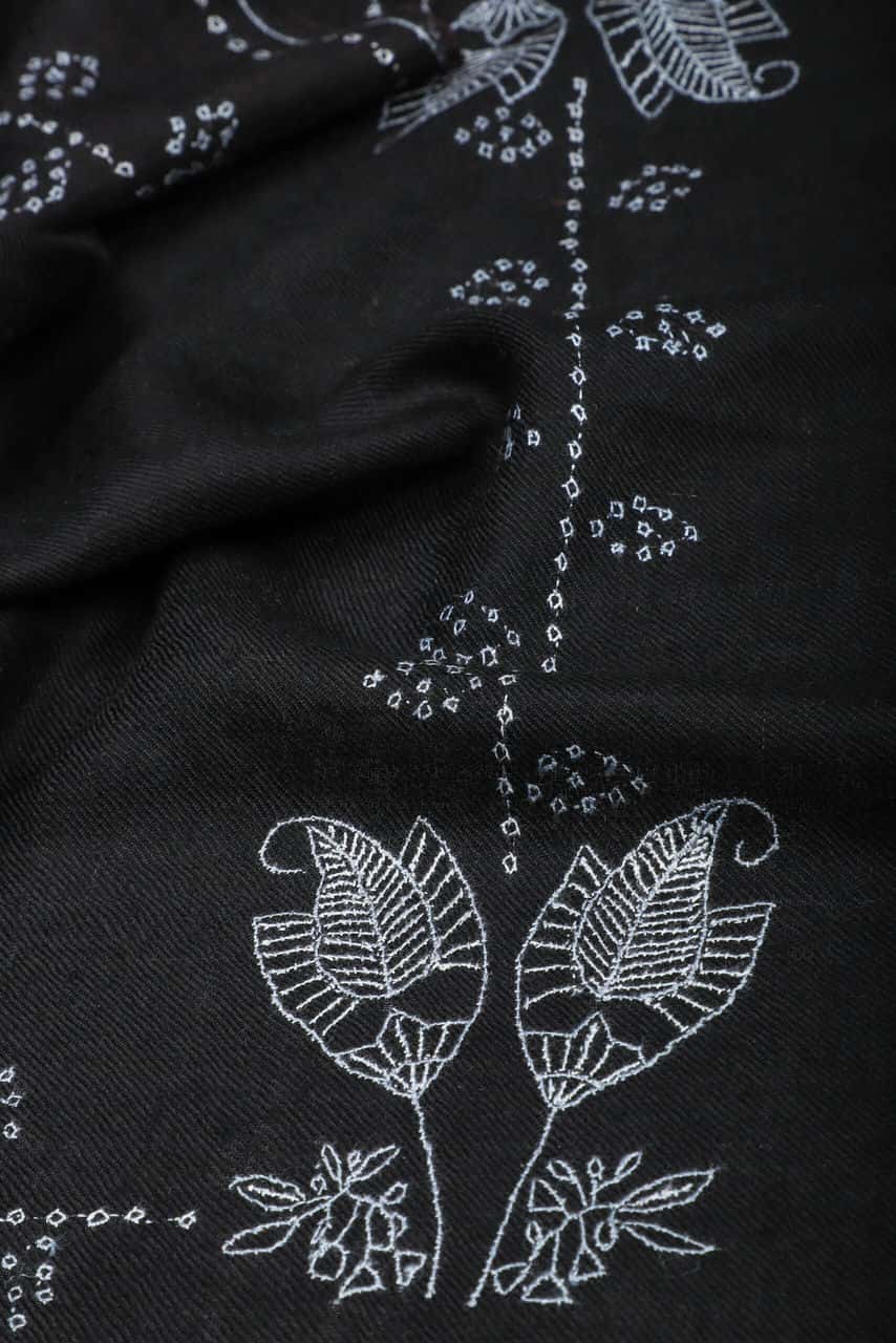 Two flower design motifs in white on black paisley scarf - Me & K