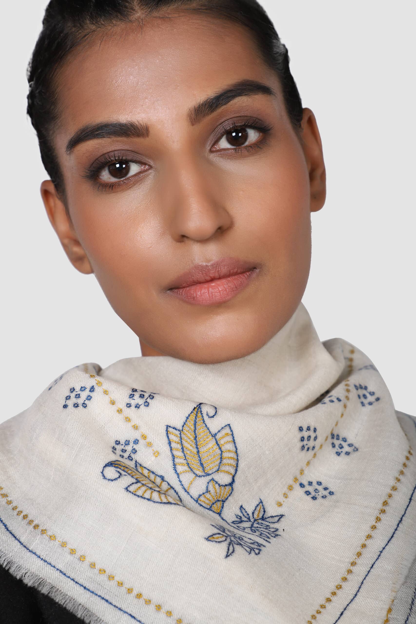 Close-up shot of a woman wearing floral cashmere neckerchief in black - Me & K
