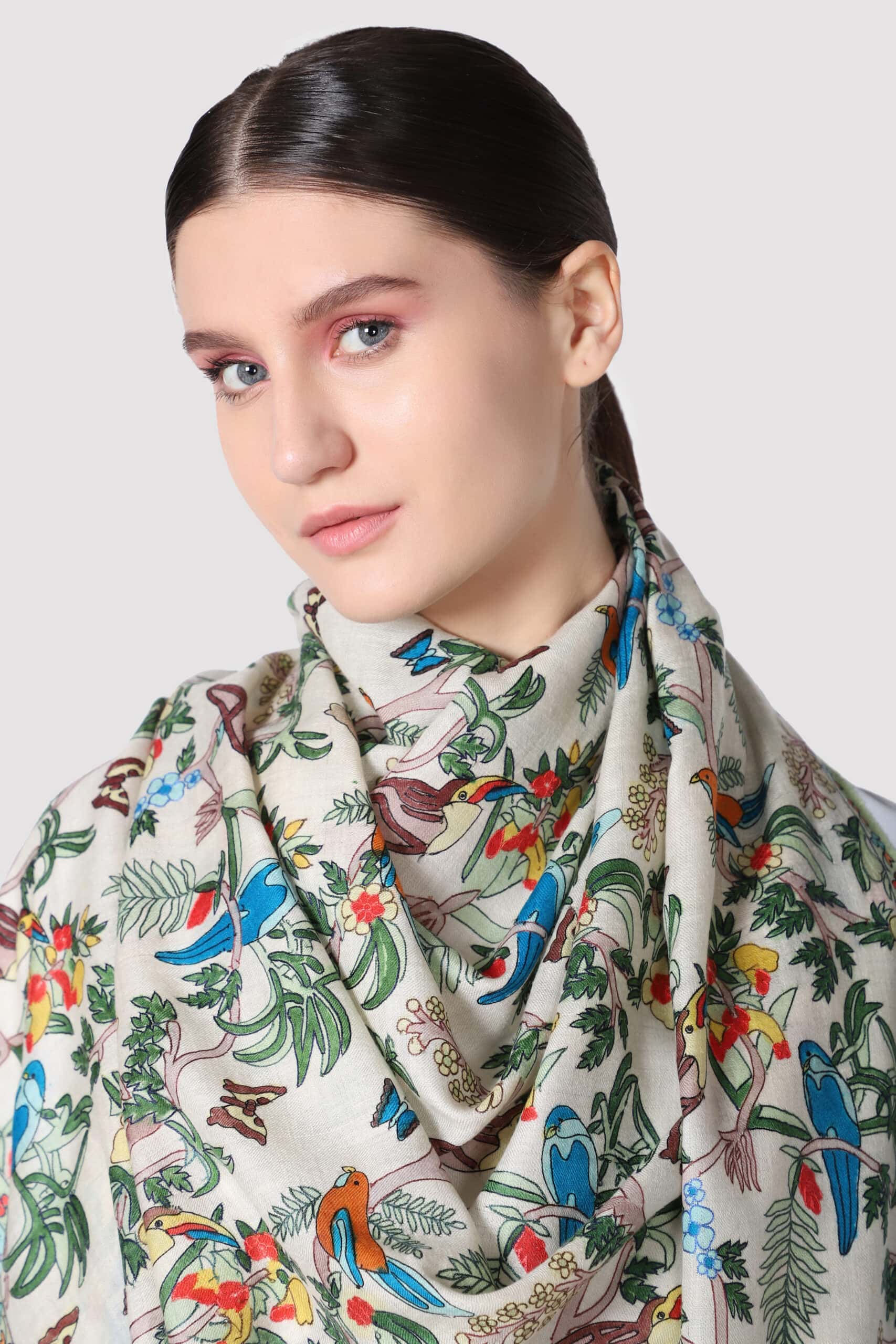 Close-up shot of a model wearing green & ivory shaded jannat shawl - Me and K