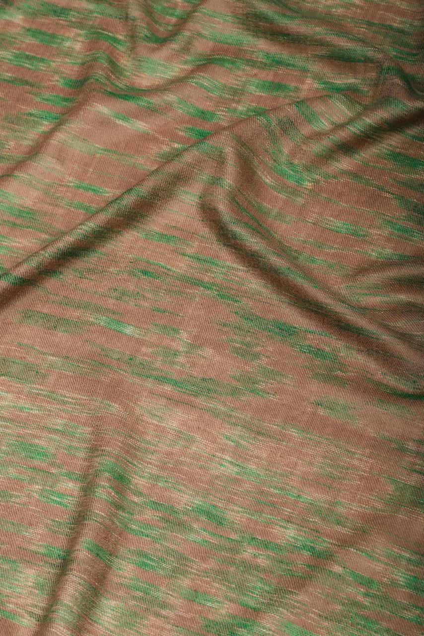 Close-up shot of handwoven natural brown & green colored Ikat cashmere shawl - Me&K